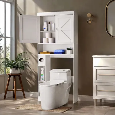 A white bathroom cabinet is shown over a toilet in a bathroom.