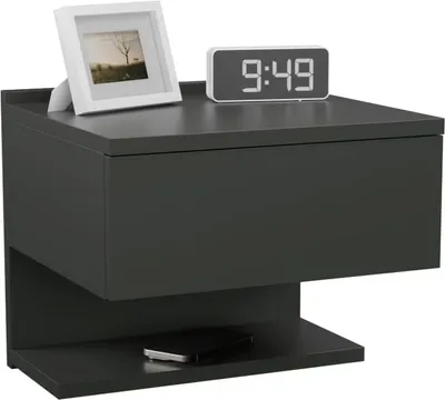 A modern gray nightstand with a drawer and shelf, featuring a framed picture and a digital clock on top. A smartphone is placed on the shelf.