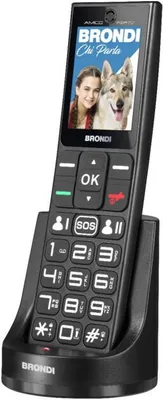 A black Brondi Amico Fidato mobile phone with a charging dock.