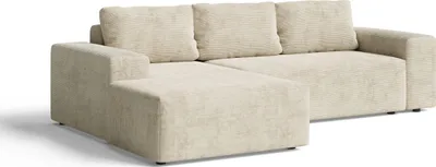 A beige sectional sofa shown from a diagonal angle against a white background.