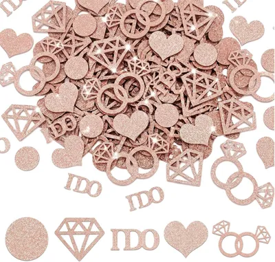Imagen del producto de Confeti color rosa oro, 100 unidades, con la inscripción "I DO", un anillo de diamantes y corazones, ideal para despedidas de soltera
