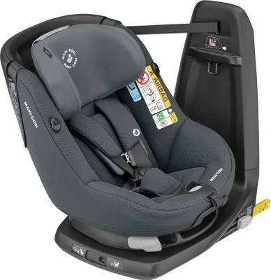 A dark gray child car seat with a black base and headrest, shown from a three-quarter angle.