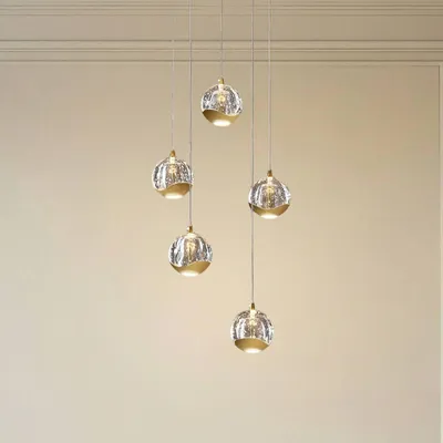 Produktbild von Lucande LED-Pendellampe Hayley, Ø 30 cm, 5-flg., gold, Glas