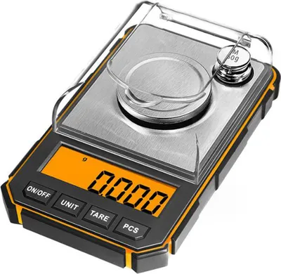 A close-up studio shot of a digital scale with a clear cover.