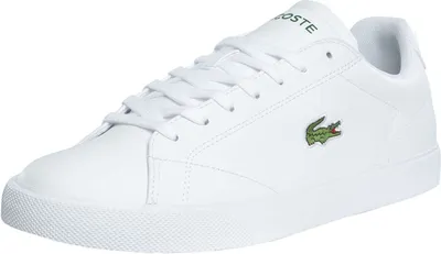 A white Lacoste sneaker is shown from a side angle against a white background.
