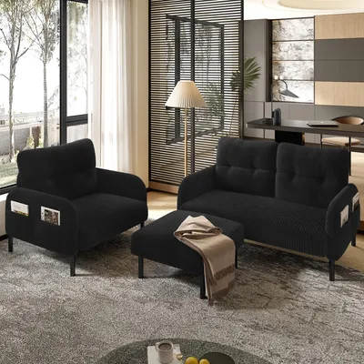 A modern living room scene with black furniture.