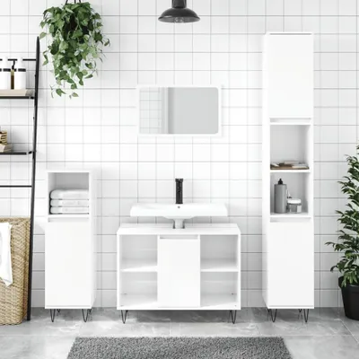 A modern bathroom vanity set with a sink, cabinet, and tall storage unit against a tiled wall.
