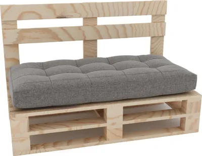 A pallet bench with a gray cushion against a white background.