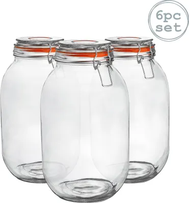 Three clear glass jars with orange seals and metal clasps are arranged in a group against a white background.