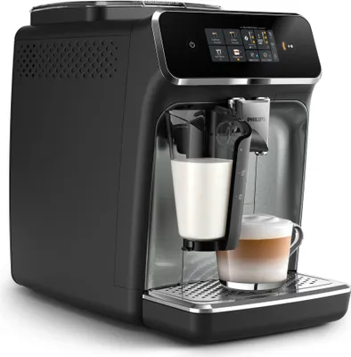 A black automatic coffee machine with a glass of milk and a cup of latte.