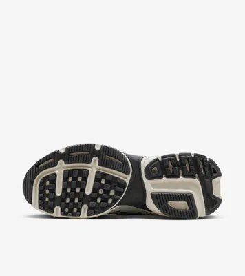 The underside of a sneaker is shown against a white background.