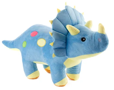 A blue plush dinosaur toy with yellow spikes and horns, and colorful polka dots on its back, is shown against a white background.