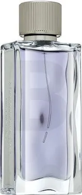 A clear studio shot of a perfume bottle.