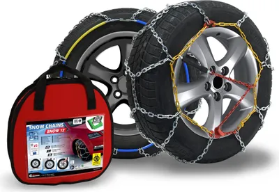 A red carrying bag with product information and two snow chains on car tires.