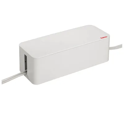 A white cable management box with cables entering from the left and exiting to the right.