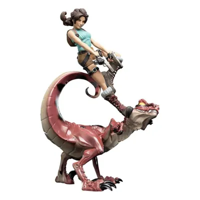 A Lara Croft figurine riding a raptor.