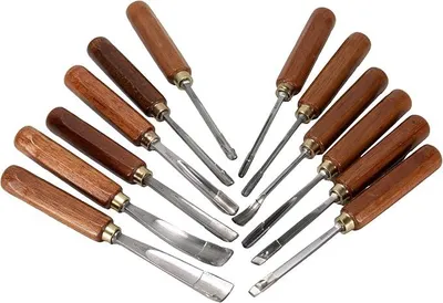 Imagen del producto de Silecomplaza, juego de 12 piezas para tallado, en estuche. Incluye: juego de herramientas para tallar, cincel, juego de herramientas de grabado, punzón