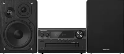 A Panasonic SC-PMX802E-K stereo system with two speakers and a central unit is displayed against a white background.