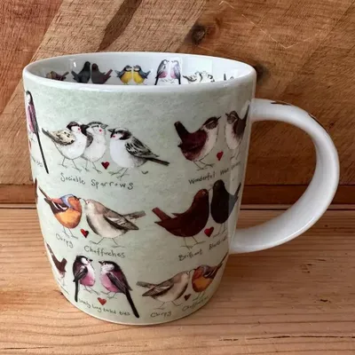 Immagine prodotto di Kubek z porcelany zdobiony motywem pary ptaszków 400 ml