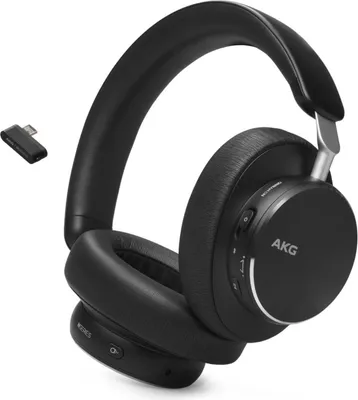 A pair of black AKG headphones with a USB dongle.