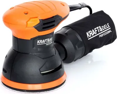 A product shot of an orange and black orbital sander with a dust bag attached.