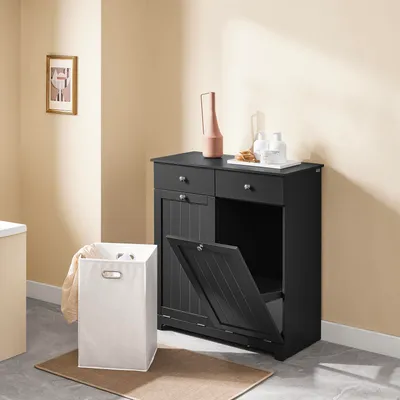 A black bathroom cabinet with a laundry basket in front of it.