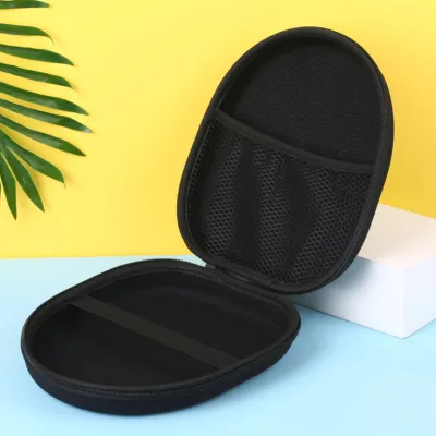 An open black headphone case is shown against a yellow and light blue background with a green leaf on the left.