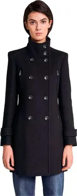 A woman wearing a black coat.