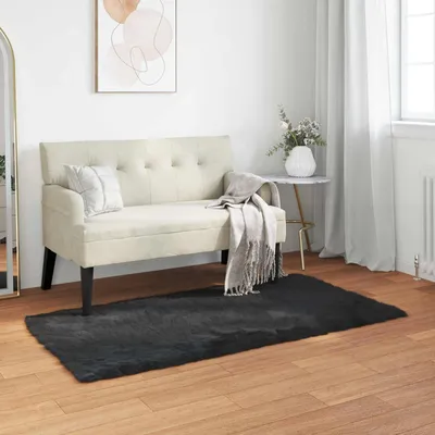 Produktbild von vidaXL Teppich aus Kunstschaffell TAFALLA Schwarz 60 x 110 cm