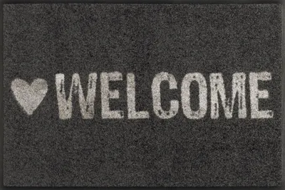 Produktbild von Fußmatte wash+dry Design Warmly Welcome 50x75 cm