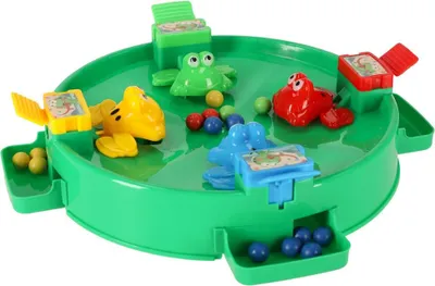 A toy frog game with multiple colored frogs and balls.