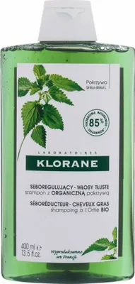 A bottle of Klorane shampoo with nettle extract.