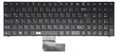 A black keyboard with a ribbon cable attached, isolated on a white background.