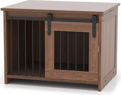 A dog crate designed to look like a piece of furniture, with a sliding door and bars.