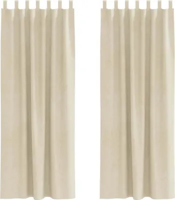 Two cream-colored velvet curtains are shown hanging against a white background.