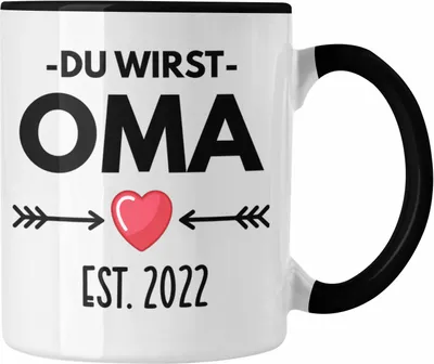 Produktbild von Trendation - Oma Du Wirst Oma 2022 Geschenk Schwangerschaft Verkünden Omi Überraschung Baby Kaffeetasse (Schwarz)