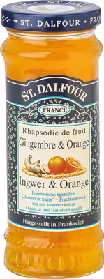 A jar of St. Dalfour fruit spread with ginger and orange flavor.