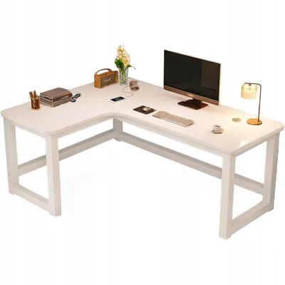 A white L-shaped computer desk with various office supplies and electronics on it.