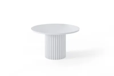 A white round coffee table with a fluted base on a white background.
