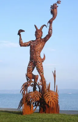 Produktbild von Casa Padrino Luxus Deko Skulptur Pan Rost 125 x 126 x H. 295 cm - Riesige Stahl Skulptur - Riesige Garten Deko Figur - Garten Skulpturen - Metall Skulpturen