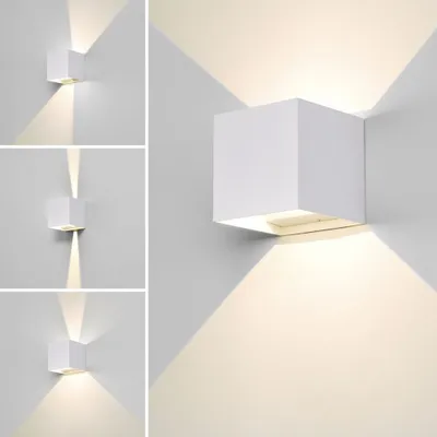 A collage of images showing a white cube-shaped wall lamp emitting light upwards and downwards.