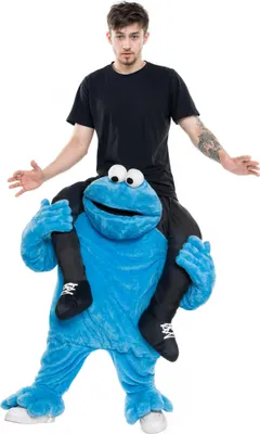 A person is riding on the shoulders of a Cookie Monster costume.