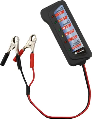 A car battery and alternator tester with alligator clips is shown against a white background.