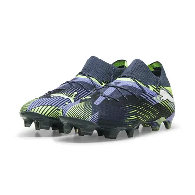A pair of Puma football boots on a white background.