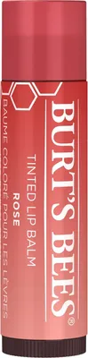 A close-up, front-facing studio shot of a Burt's Bees tinted lip balm in a rose shade.