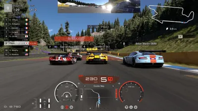 A racing video game scene showing multiple cars on a track with a heads-up display.