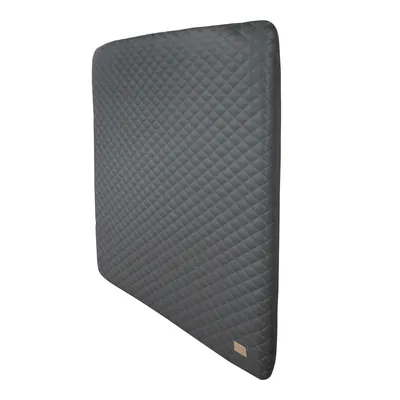 A quilted gray changing pad shown from a diagonal angle against a white background.