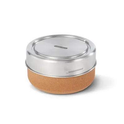 A round lunchbox with a silver lid and a textured brown base, isolated on a white background.