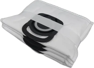A stack of white vacuum cleaner bags with black plastic connectors.