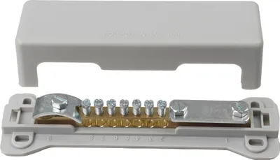 A grounding bar with a cover, shown disassembled.